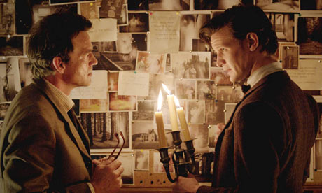 Dougray Scott and Matt Smith talk over candle light as Prof. Alex Palmer and The Doctor in Doctor Who's Hide.