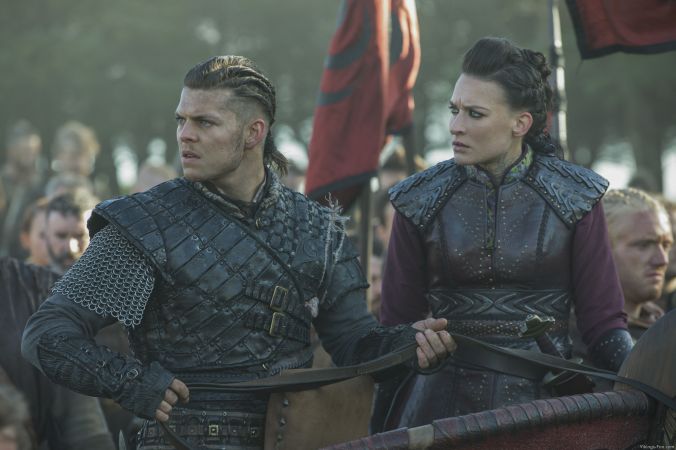 Alex Høgh and Josefin Asplund as Ivar the Boneless,and Astrid as they listen to the outcome of the battle.